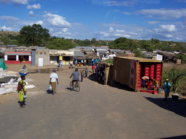 A soft drinks trader busy at work in Tete