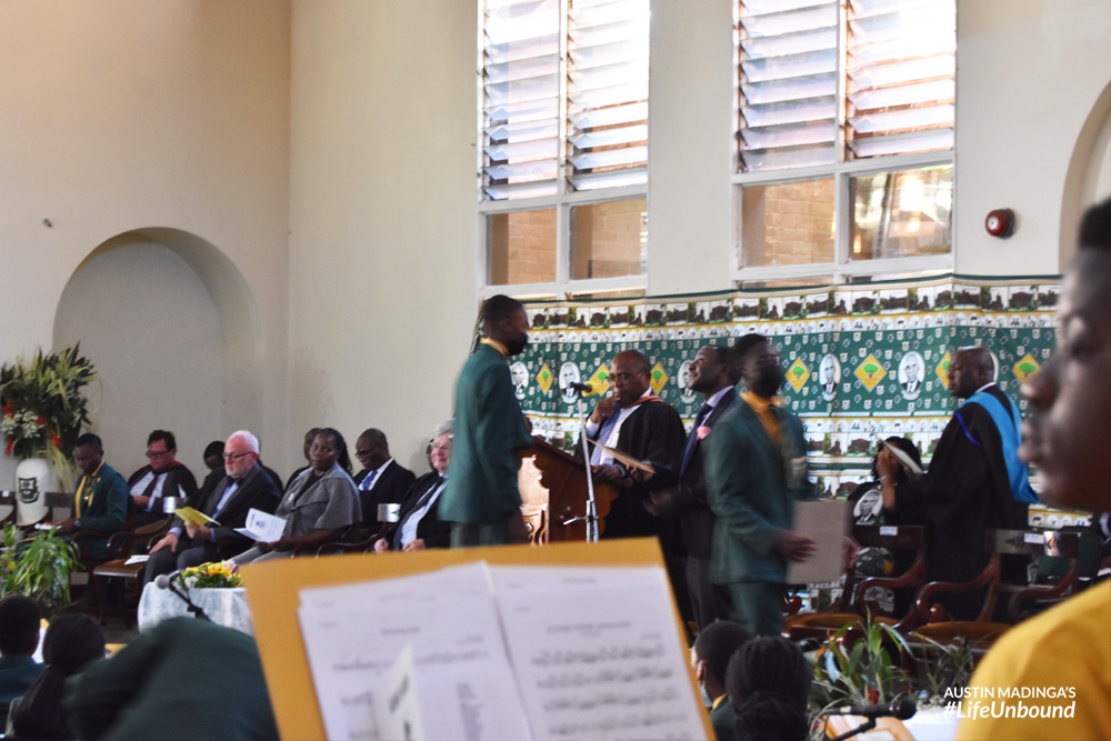 Students receiving awards from Kamuzu Cademy deputy headmaster and guest of honour, University of Malawi vice chancellor