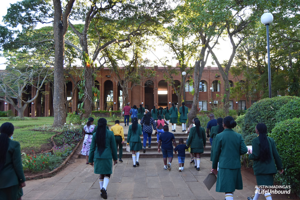 Students and parents walking out of the Kamuzu Academy awards ceremony