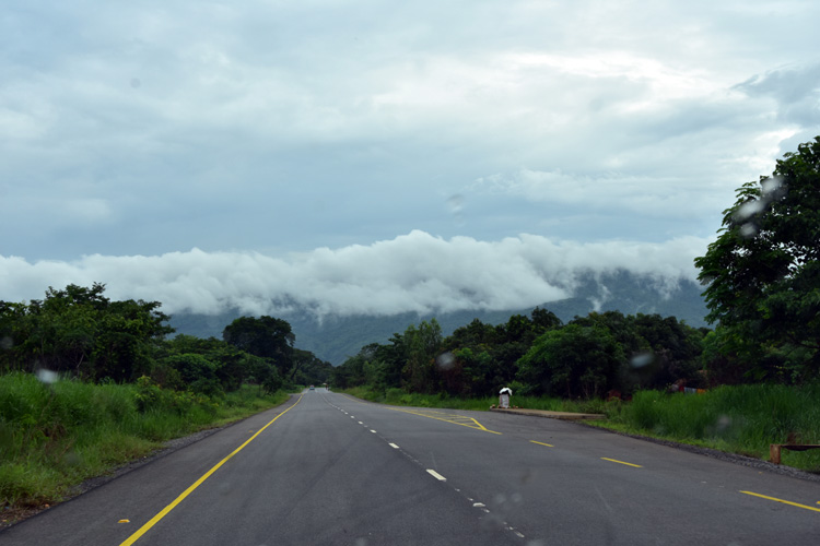 clouds form over the hills